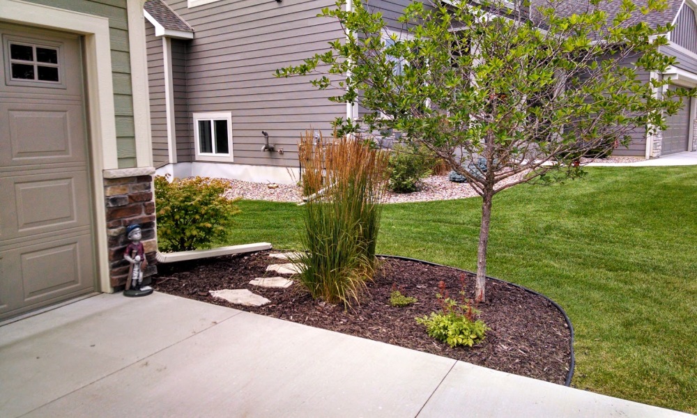 Landscaping, Paver, Stamped Concrete Patio, Retaining Walls Design and Installation in Rochester, Mn Area
