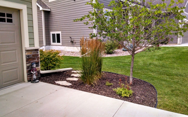 Landscaping, Paver, Stamped Concrete Patio, Retaining Walls Design and Installation in Rochester, Mn Area